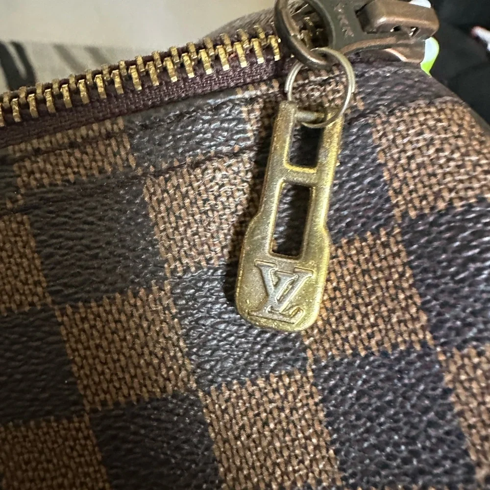 Elegant Checkered Brown Duffel Bag